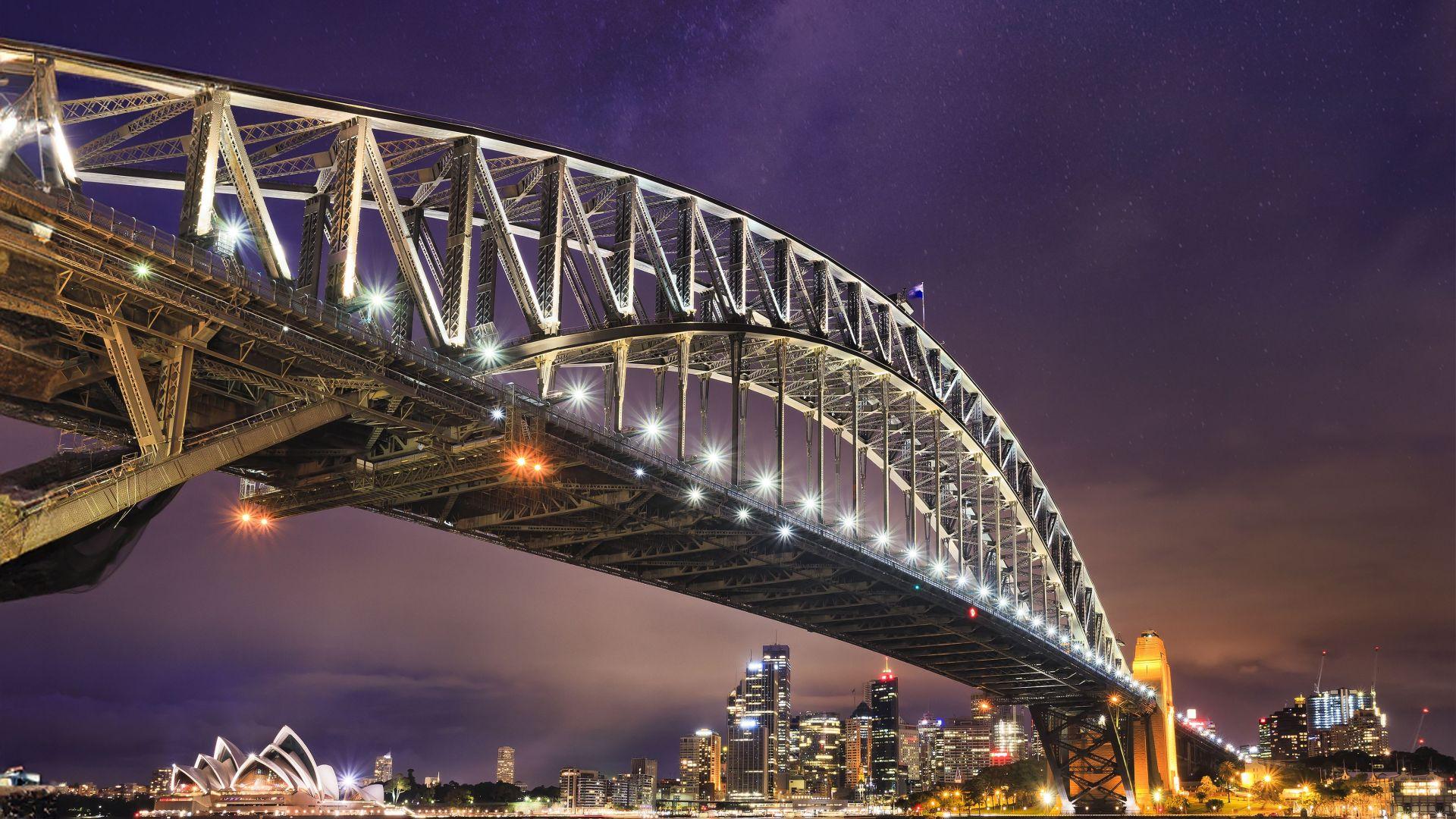 Photo of bridge in Sydney in the night
